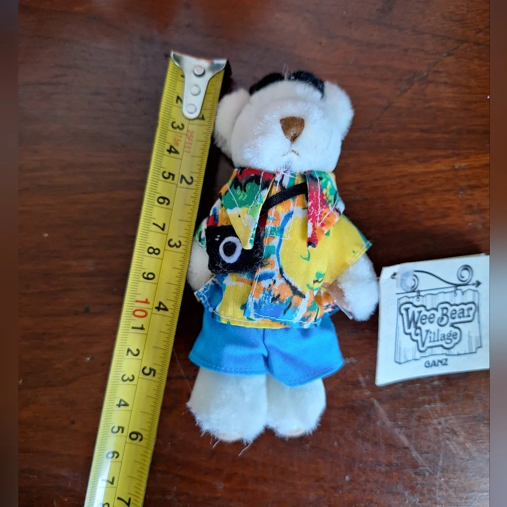 Collectible teddy bears from the Ganz brand, specifically from the Wee Bear Vill